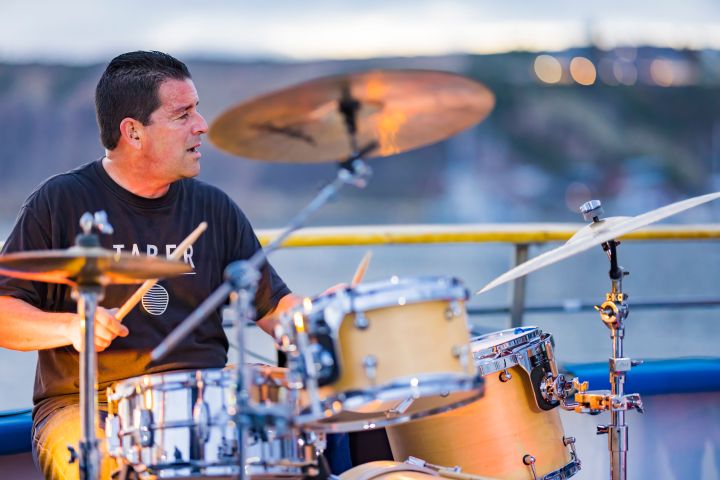 a man sitting on a stage