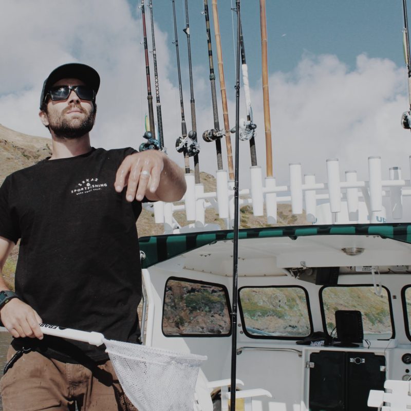 a man riding on the back of a truck