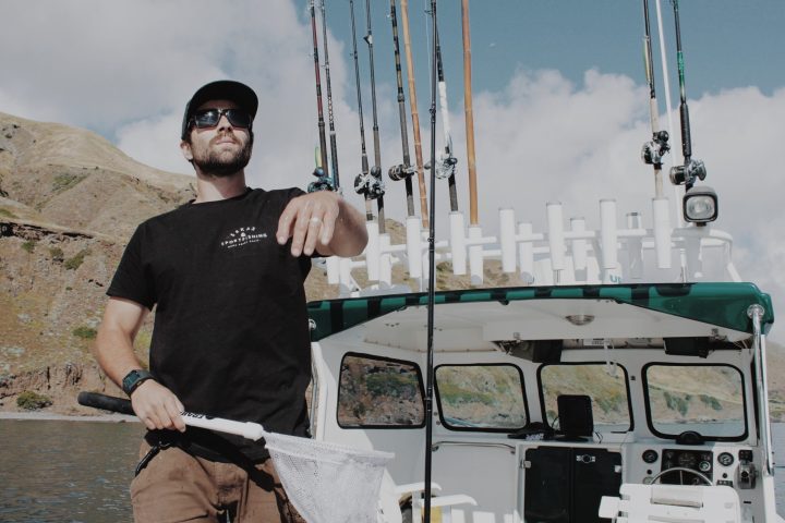 a man riding on the back of a truck