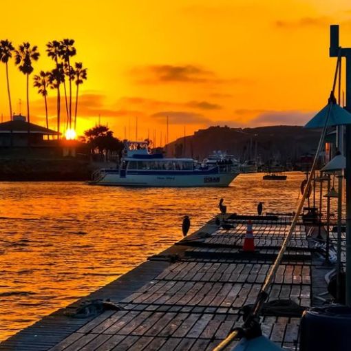 a sunset over a body of water