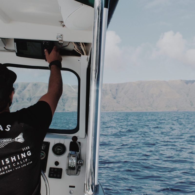 a man in a boat on a body of water