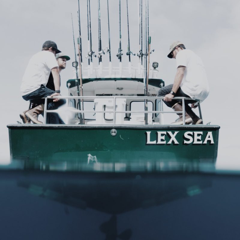a man riding on the back of a boat