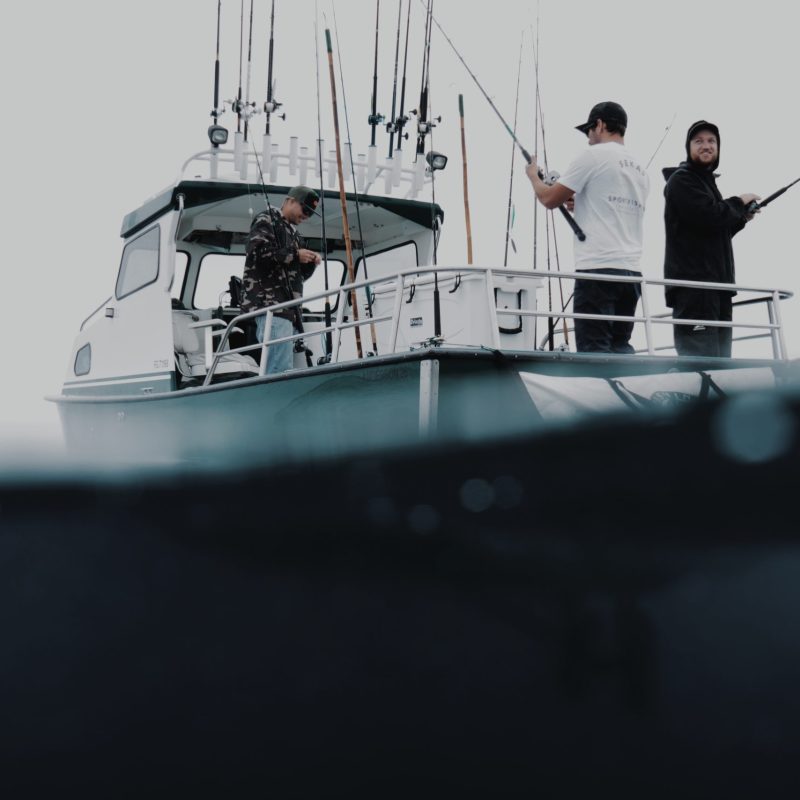 a man on a boat in the water