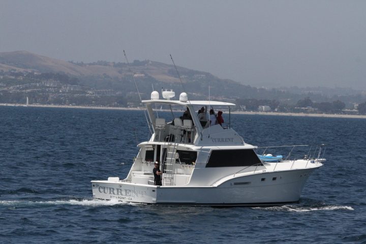 a small boat in a large body of water