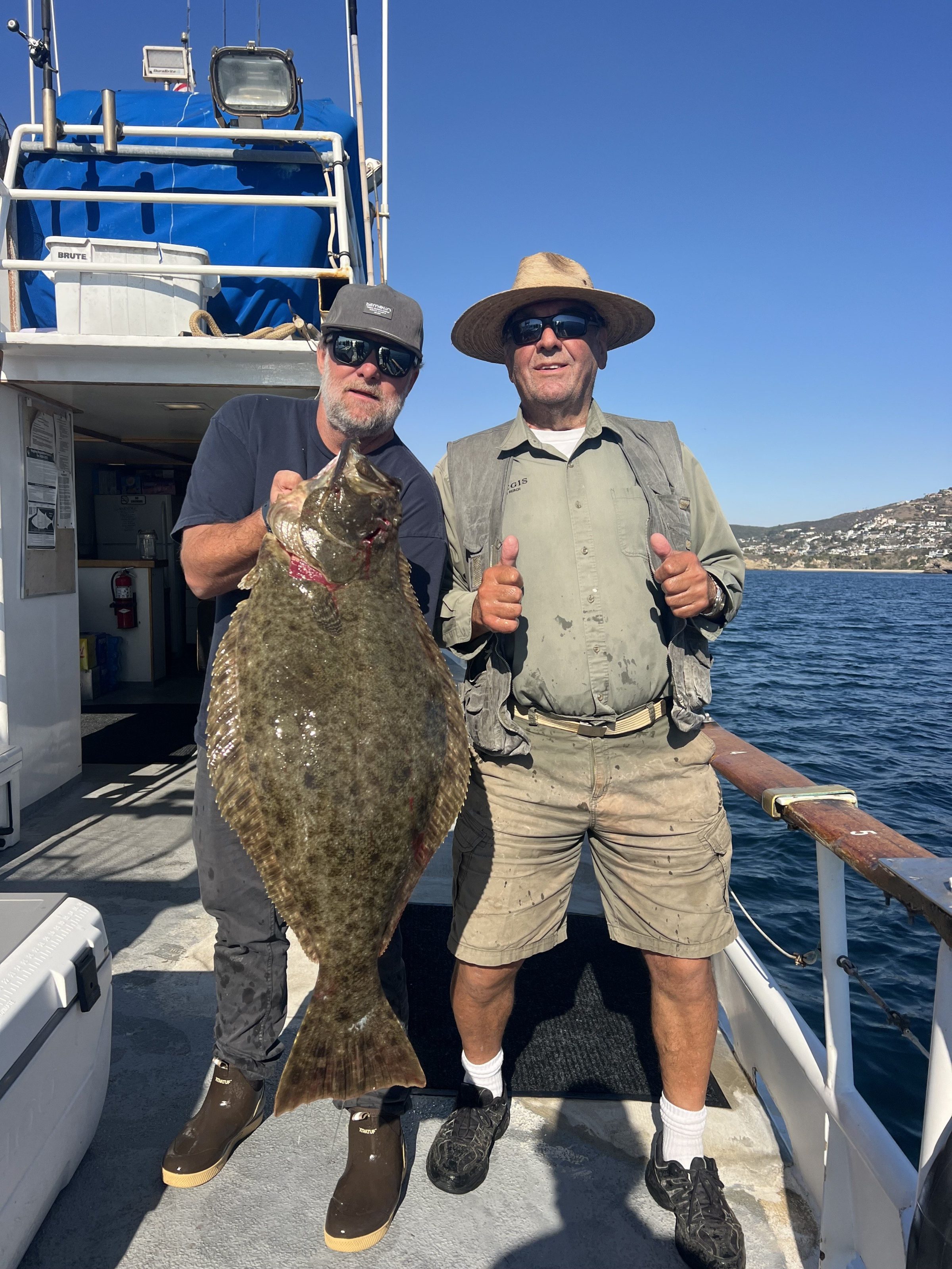 a man holding a fish