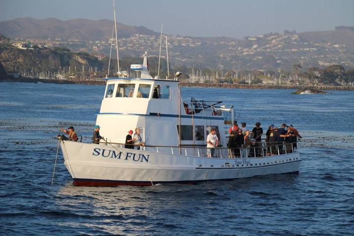 a small boat in a large body of water