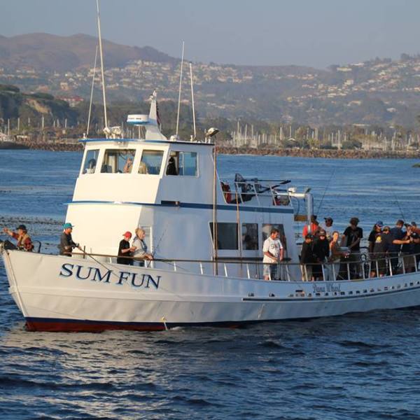 a small boat in a large body of water
