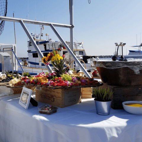 a boat sitting on top of a picnic table