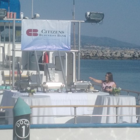 a person riding on the back of a boat