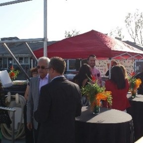 a group of people standing in front of a building