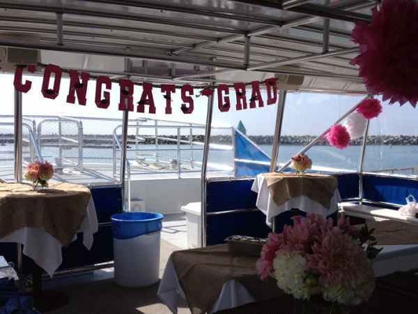 a room filled with furniture and vase of flowers on a table