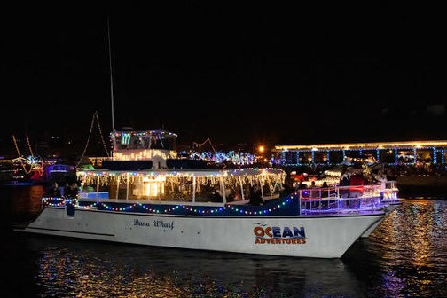 a boat is docked next to a body of water