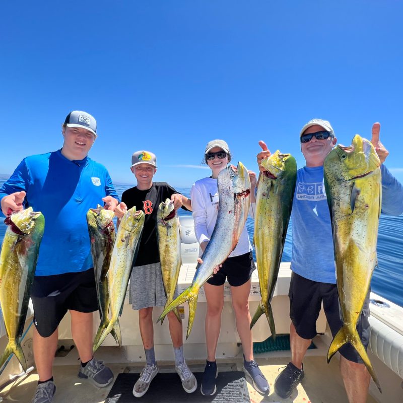 a group of people posing for the camera