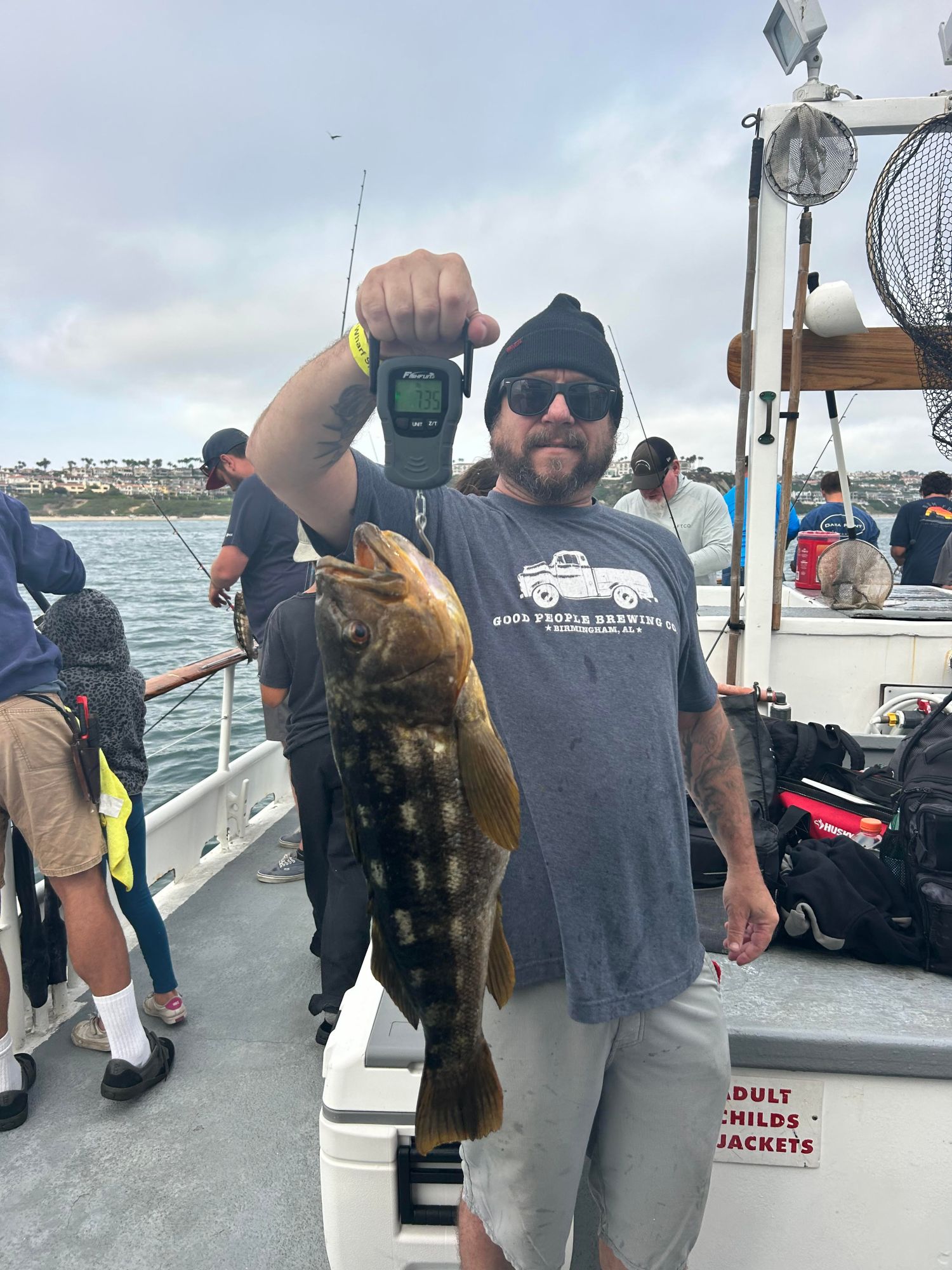 a person holding a fish