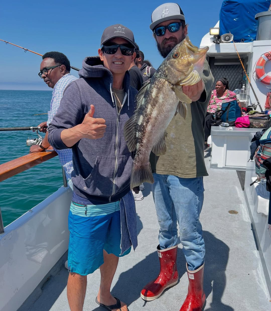 SnapInsta.to_516888028_18469092097077959_2562296950419233585_n a man holding a fish in the water