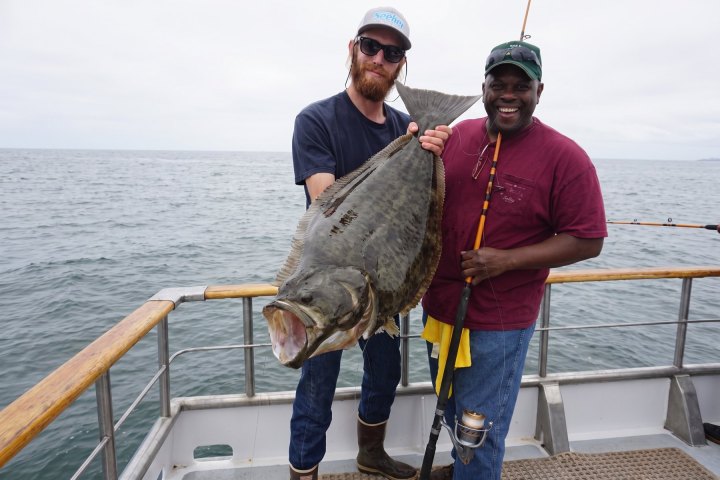 Angler with their catch on the Dana Wharf Halibut Derby out of Dana Point