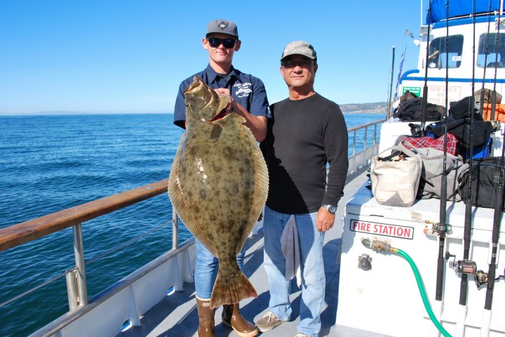 Angler with their catch on the Dana Wharf Halibut Derby out of Dana Point