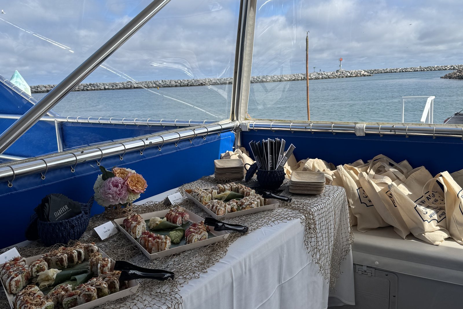 Event buffet with a view of the Dana Point Harbor breakwater