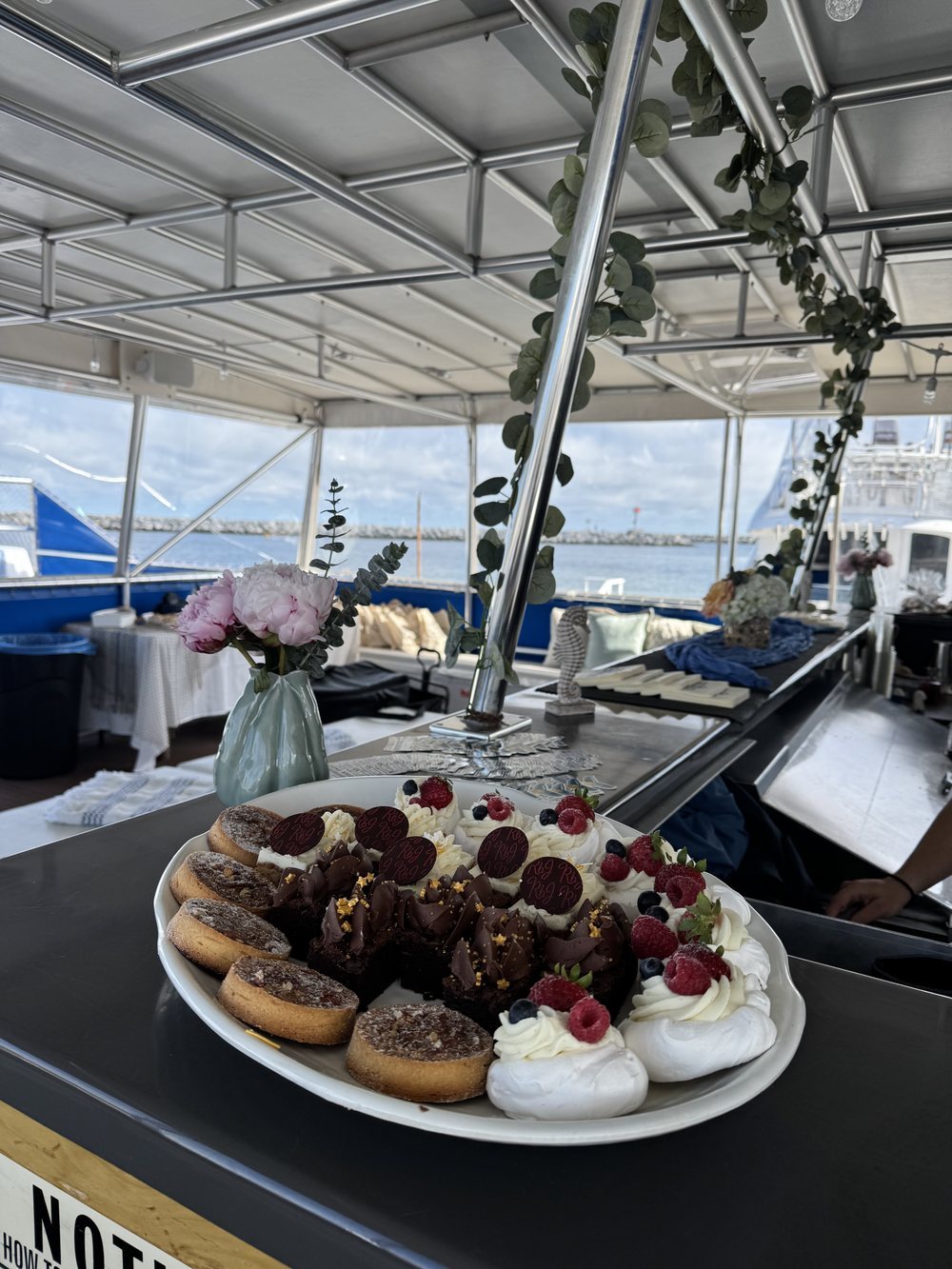 Dessert platter on the bar at a private event on board