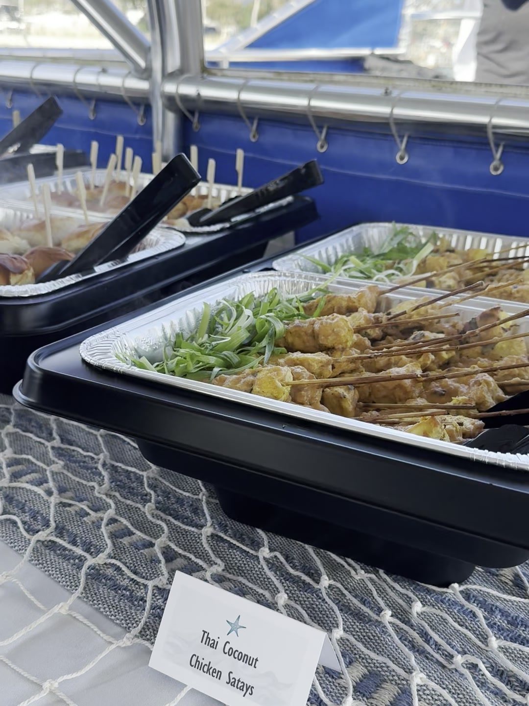 Thai coconut chicken satay served at a private event on board