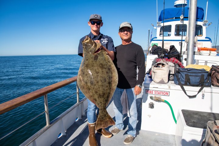 Angler with their catch on a Dana Wharf 3/4-day fishing trip out of Dana Point