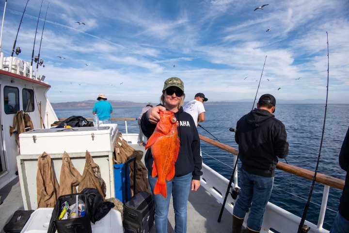 Angler with their catch on a Dana Wharf 3/4-day fishing trip out of Dana Point
