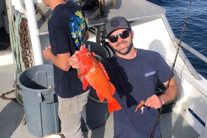 Angler with their catch on a Dana Wharf 3/4-day fishing trip out of Dana Point